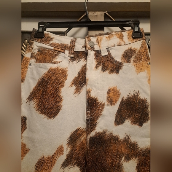 WeWoreWhat stiletto slit cow print jeans. - Picture 3 of 7